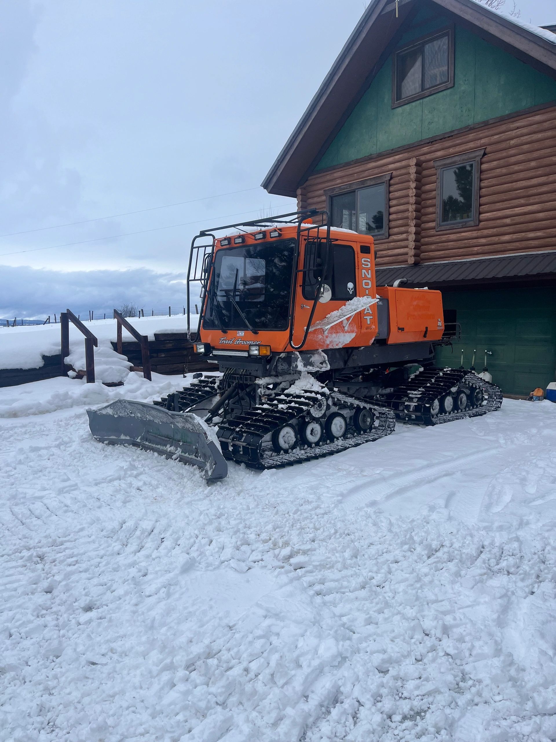 Paul's Tucker Sno-Cat grooming deep mountain snow